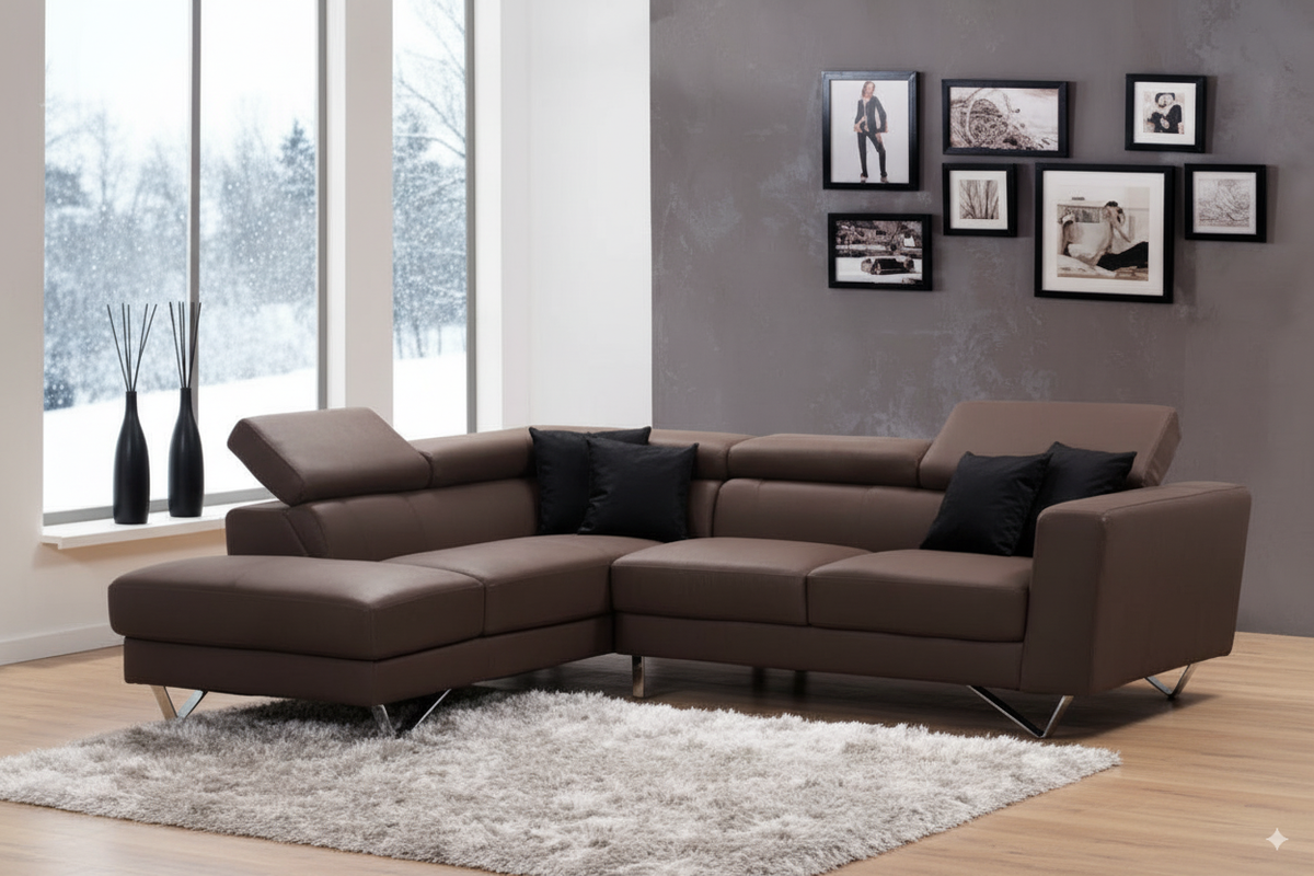 A brown leather sectional on a white shag rug over a light wood floor beside snowy windows.