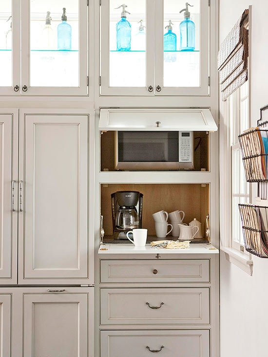 Custom cabinets with built in hidden microwave
